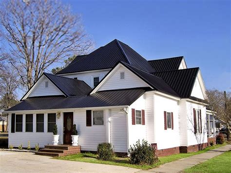 black metal roof whit brick house|metal roof for brick house.